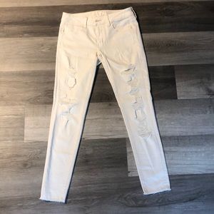 American Eagle cream colored, ripped jeans